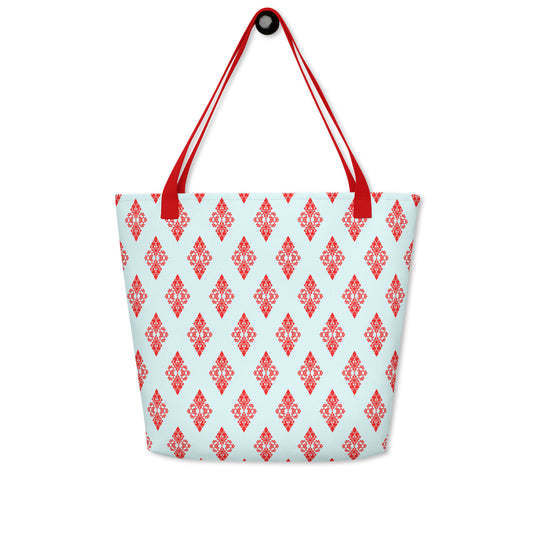 Hung large tote bag with the 'Digon' sky blue and red fractal geometric pattern.