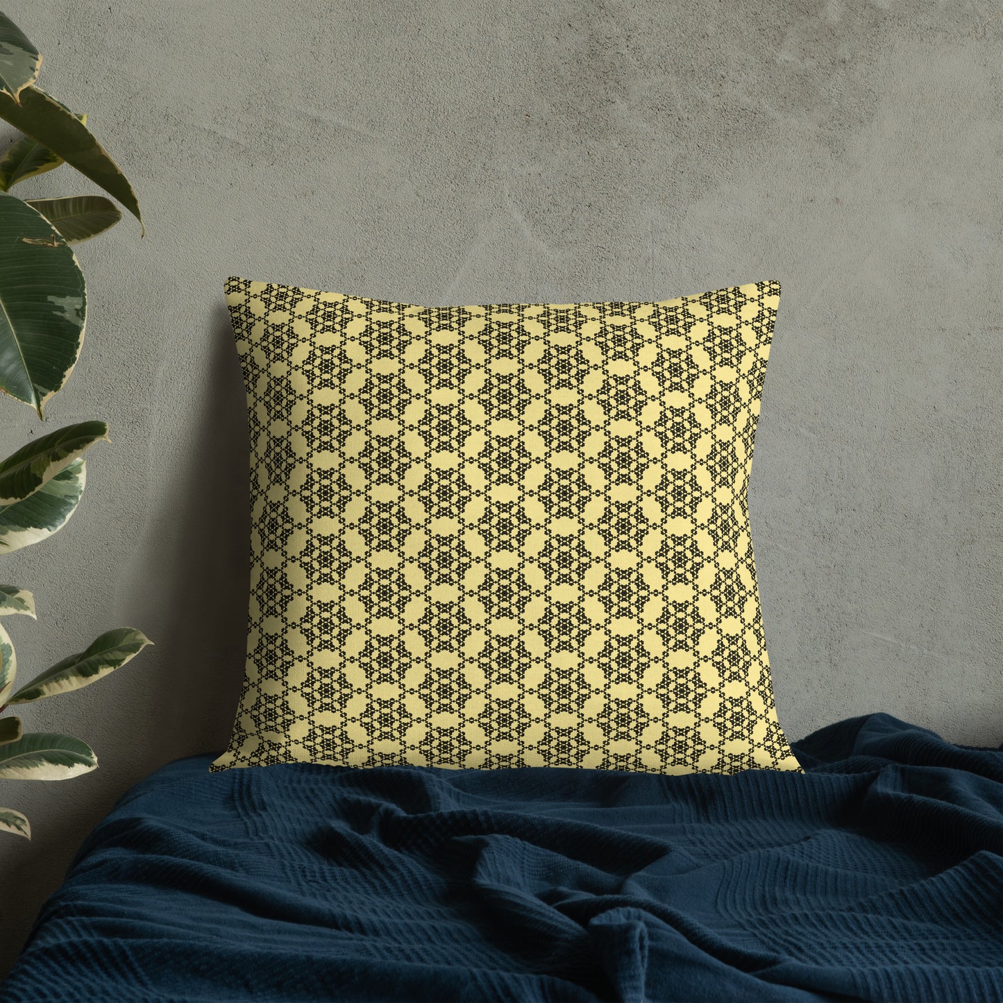 22″×22″ premium throw pillow with the 'Hexagon' yellow and black geometric pattern on a bed.