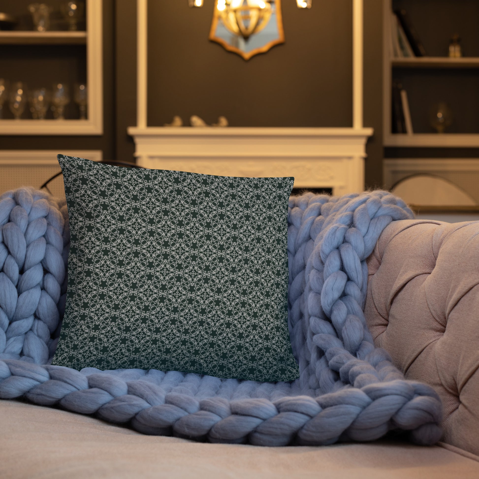 Front of the 18″×18″ basic pillow with the 'Quadragon' charcoal and white fractal geometric pattern on a sofa.