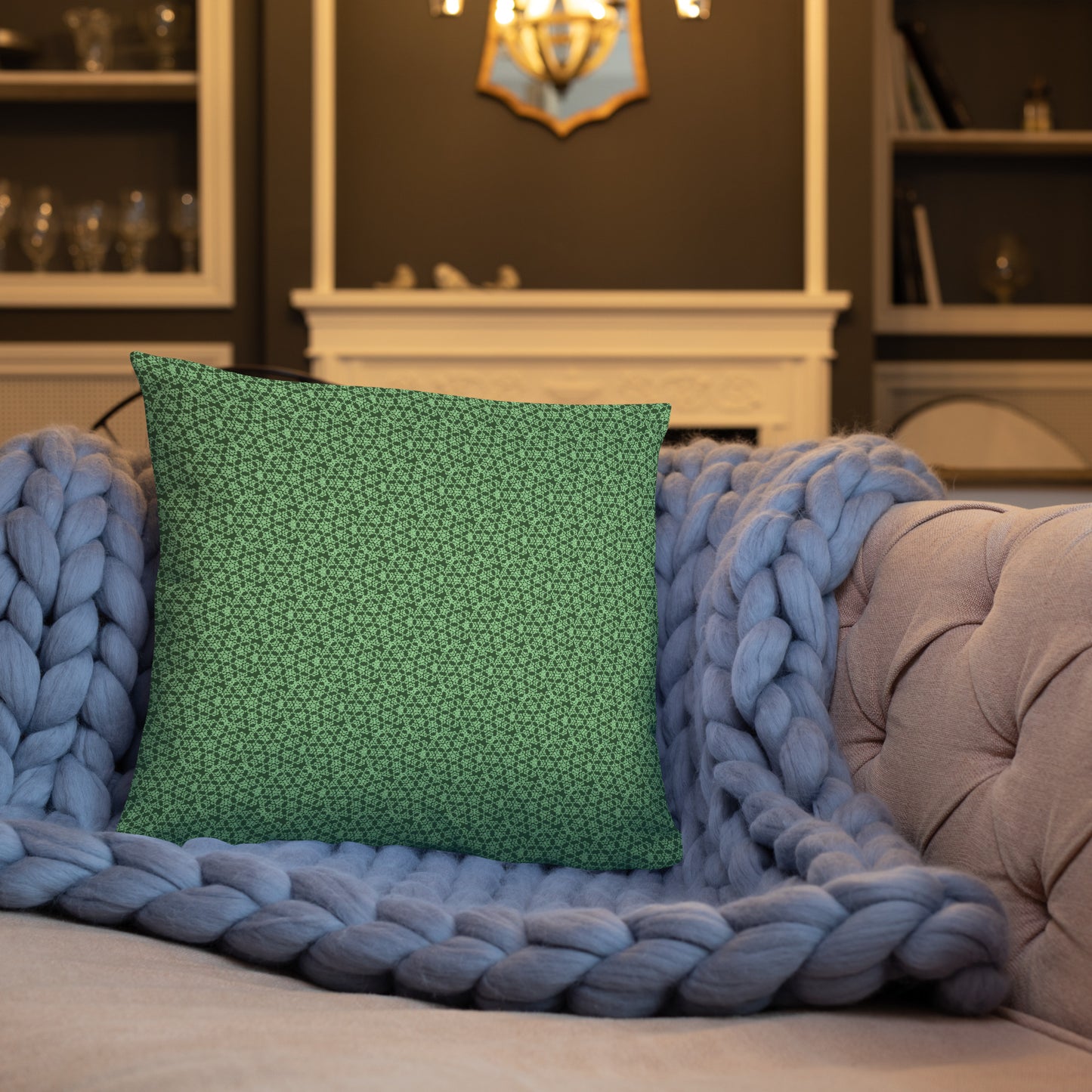 18″×18″ throw pillow with the 'Heptagon' green geometric pattern on a sofa.