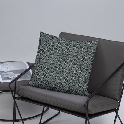 Front of the 18″×18″ basic pillow with the 'Quadragon' charcoal and white fractal geometric pattern on a chair.