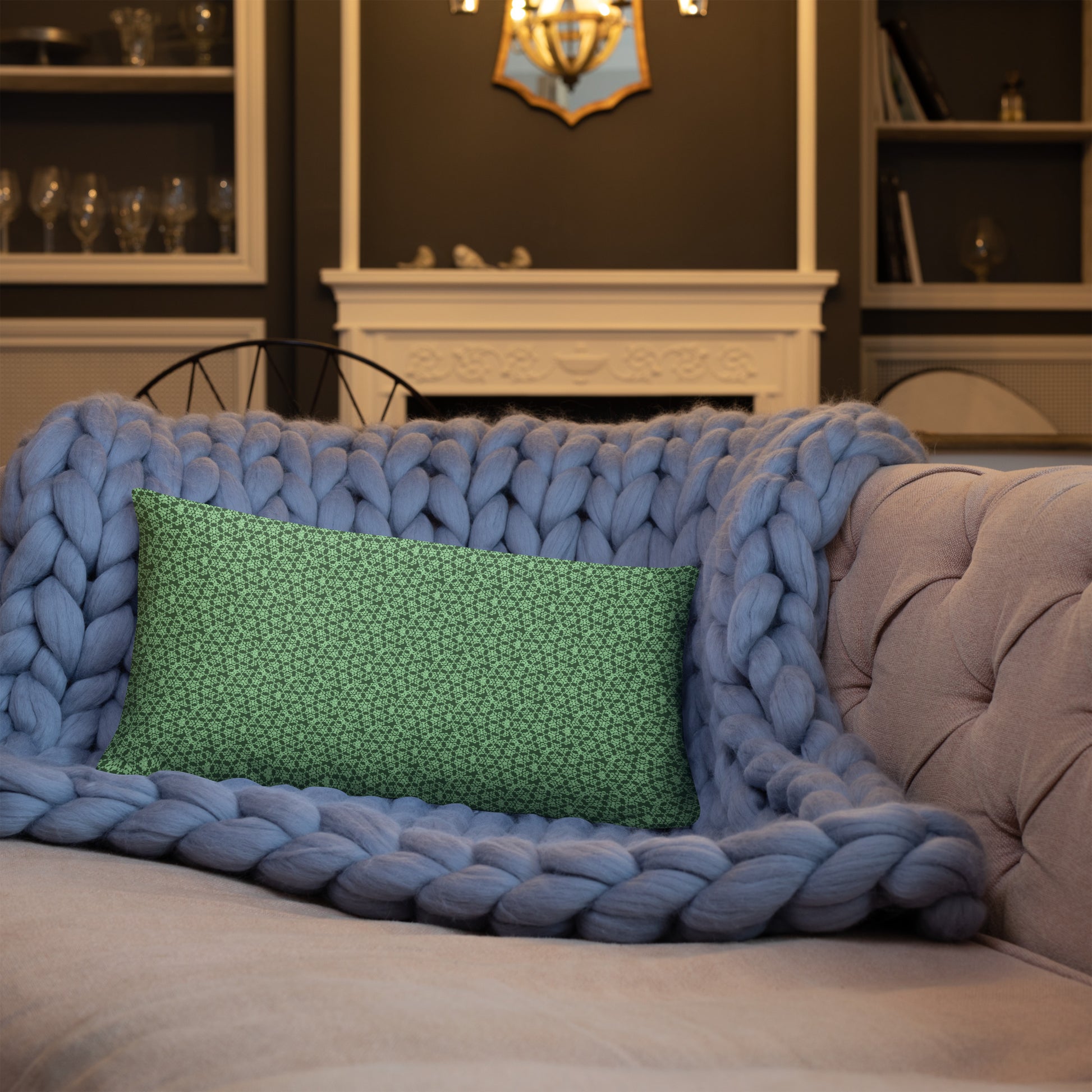 20″×12″ throw pillow with the 'Heptagon' green geometric pattern on a sofa.