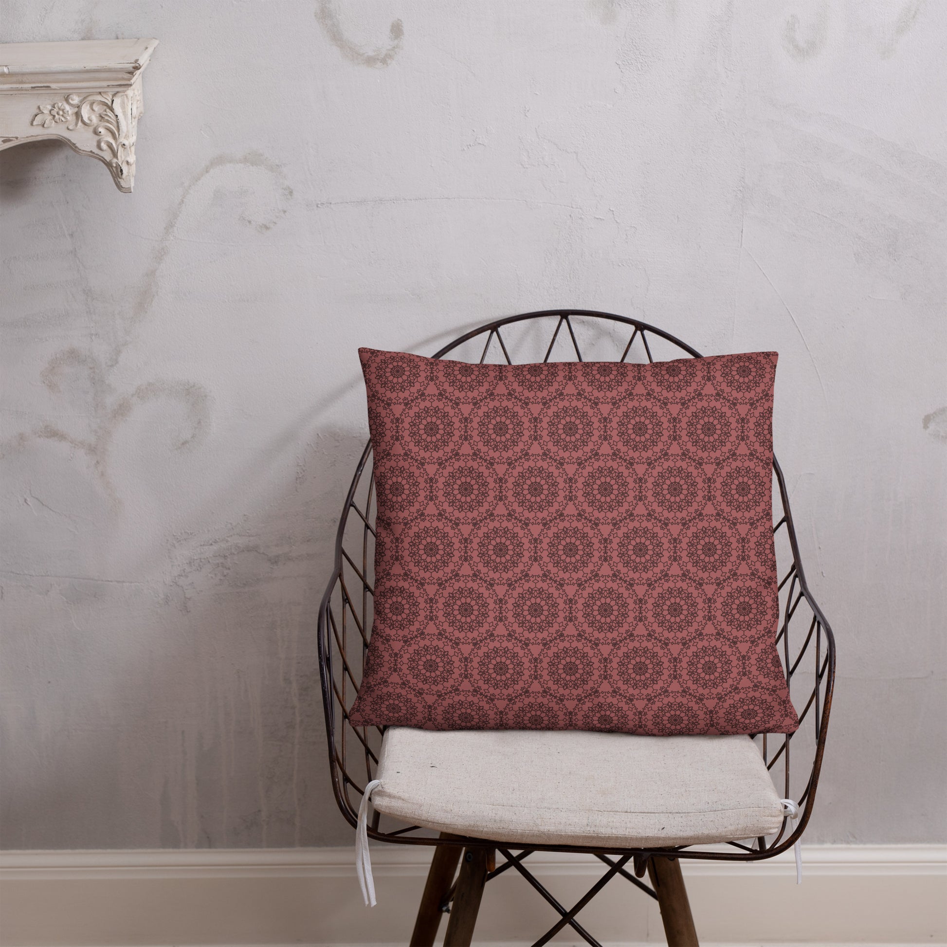 22″×22″ throw pillow with the 'Dodecagon' rose geometric pattern in a styled room setting.