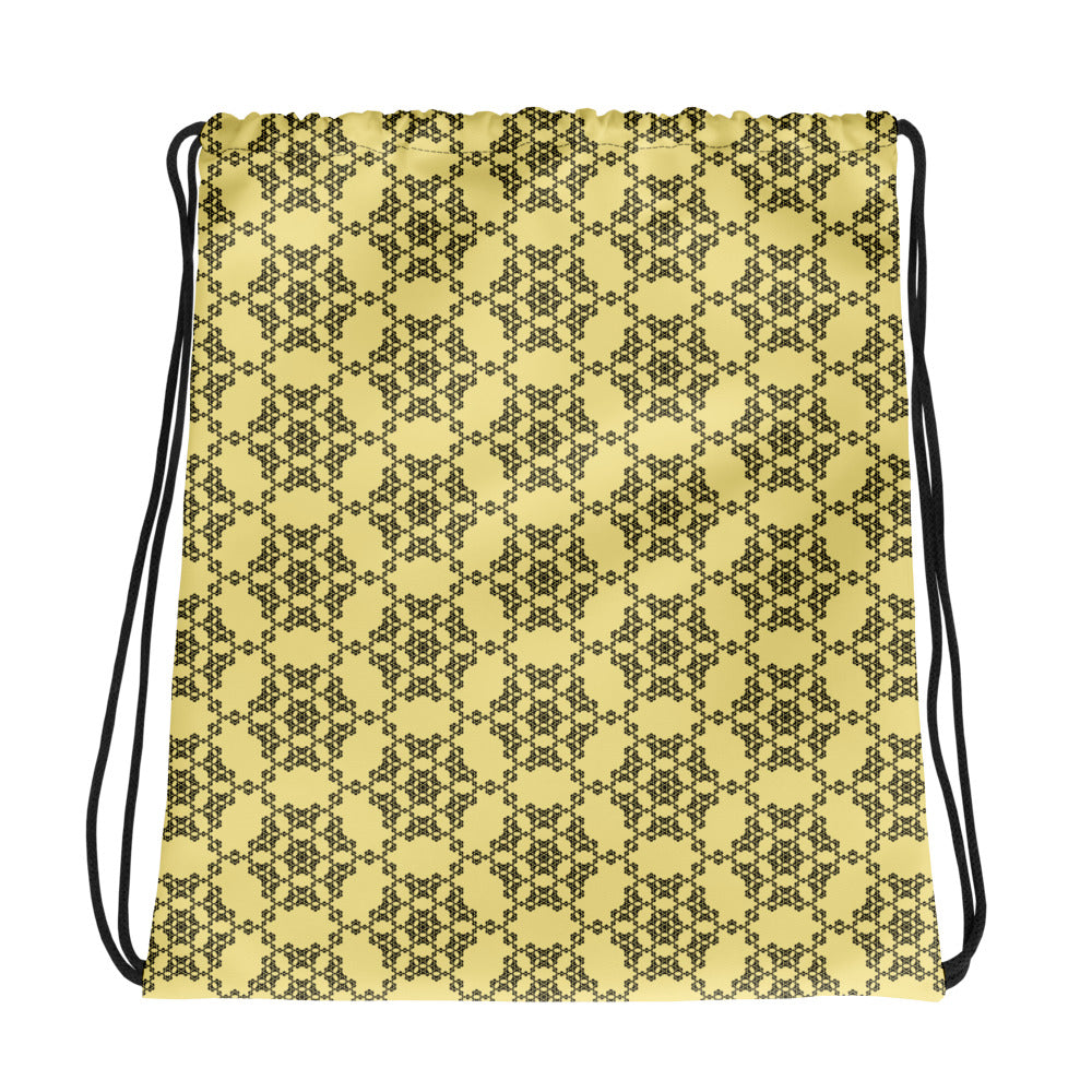 Front of the drawstring bag with the 'Hexagon' yellow and black fractal geometric pattern.