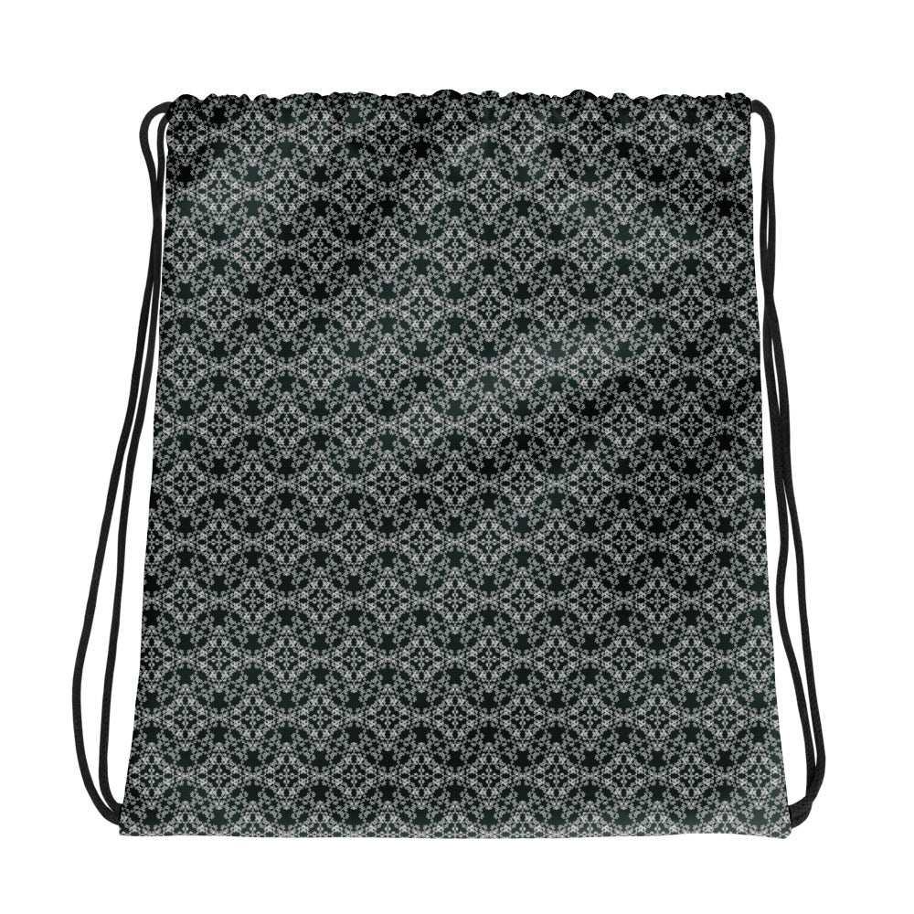 Front of the drawstring bag with the 'Quadragon' charcoal and white fractal geometric pattern.
