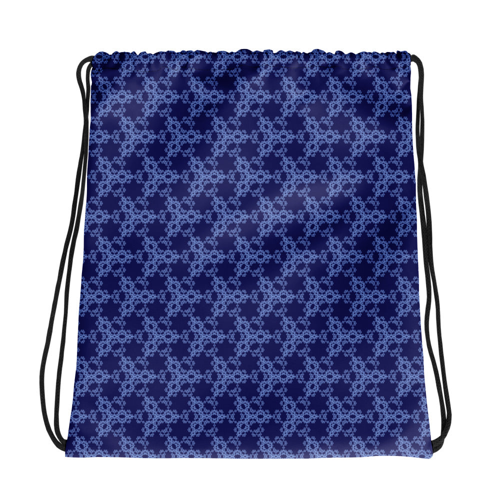 Back of the drawstring bag with the 'Triagon' navy and blue fractal geometric pattern.