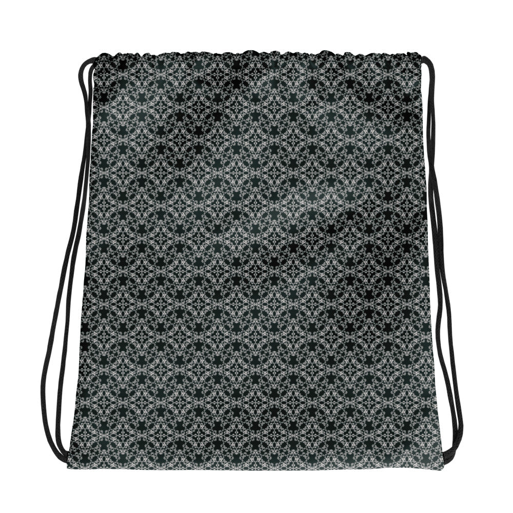 Back of the drawstring bag with the 'Quadragon' charcoal and white fractal geometric pattern.