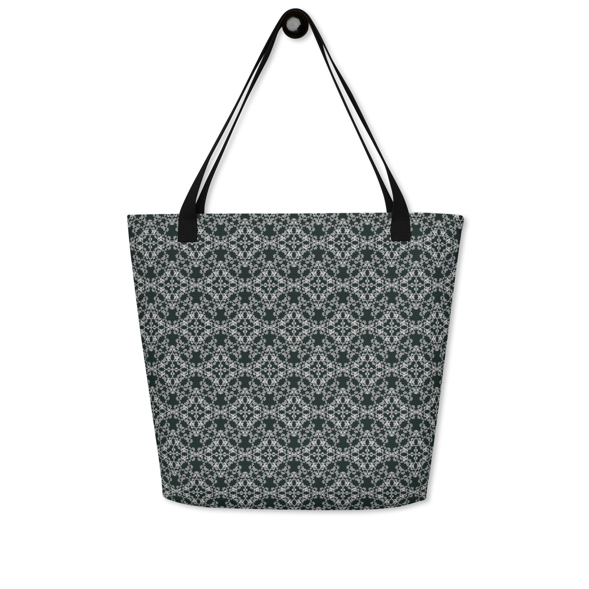 Hung large tote bag with the 'Quadragon' charcoal and white fractal geometric pattern.