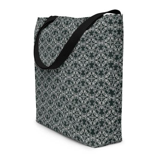 Angle shot of the large tote bag with the 'Quadragon' charcoal and white fractal geometric pattern.