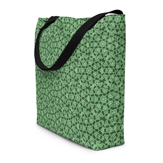 Angle shot of the large tote bag with the 'Heptagon' green fractal geometric pattern.