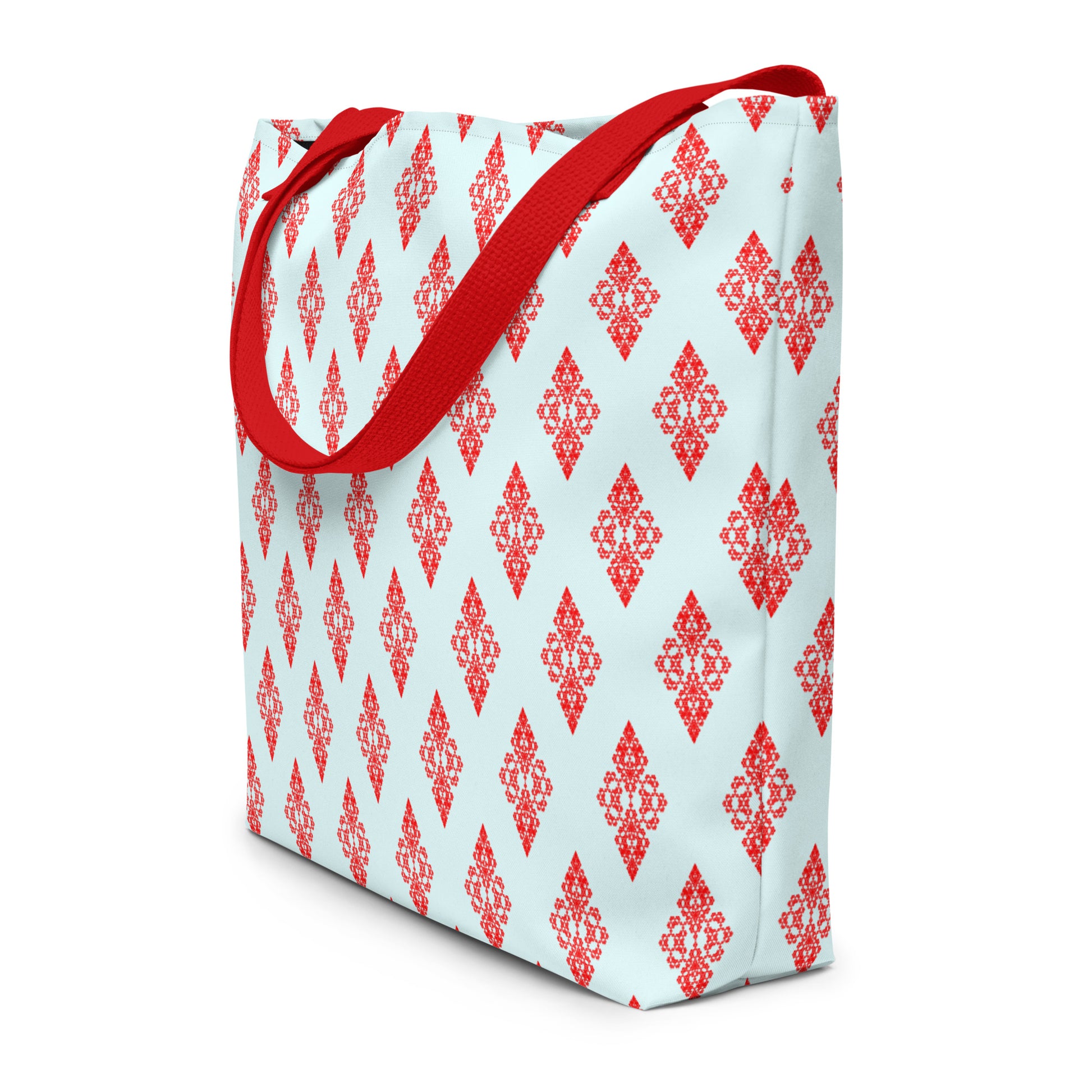 Angle shot of the large tote bag with the 'Digon' sky blue and red fractal geometric pattern.