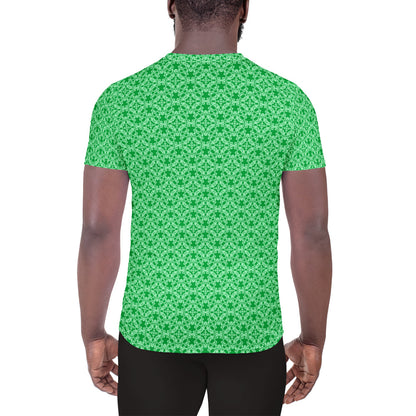 Back shot of a model wearing the men's athletic t-shirt with the 'Tetragon' green fractal geometric pattern.