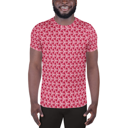 Front shot of a model wearing the men's athletic t-shirt with the 'Trigon' red and pink fractal geometric pattern.