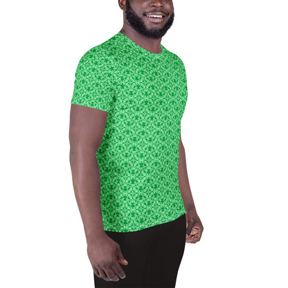Right front shot of a model wearing the men's athletic t-shirt with the 'Tetragon' green fractal geometric pattern.