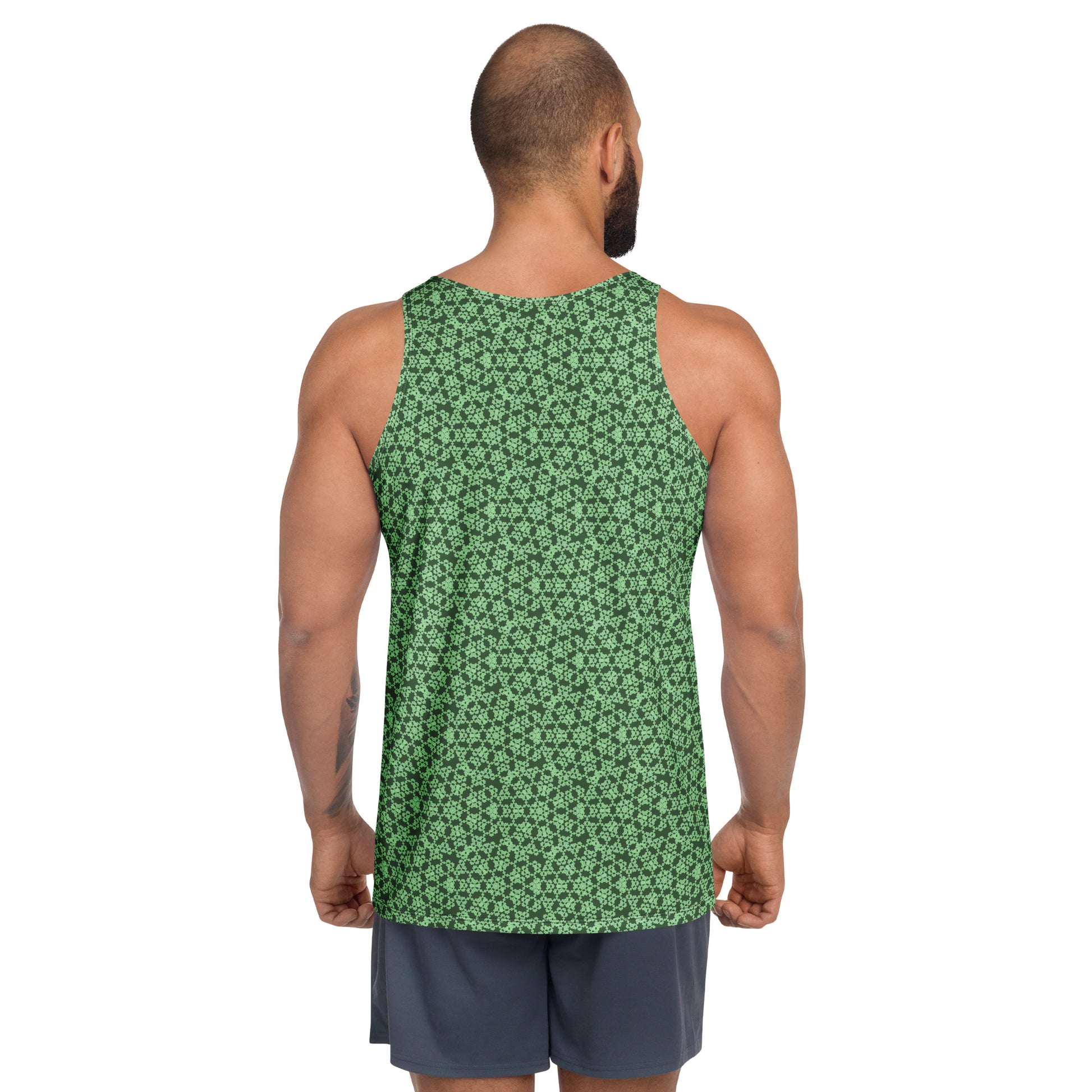 Back shot of a model wearing the men's tank top with the 'Heptagon' green fractal geometric pattern.