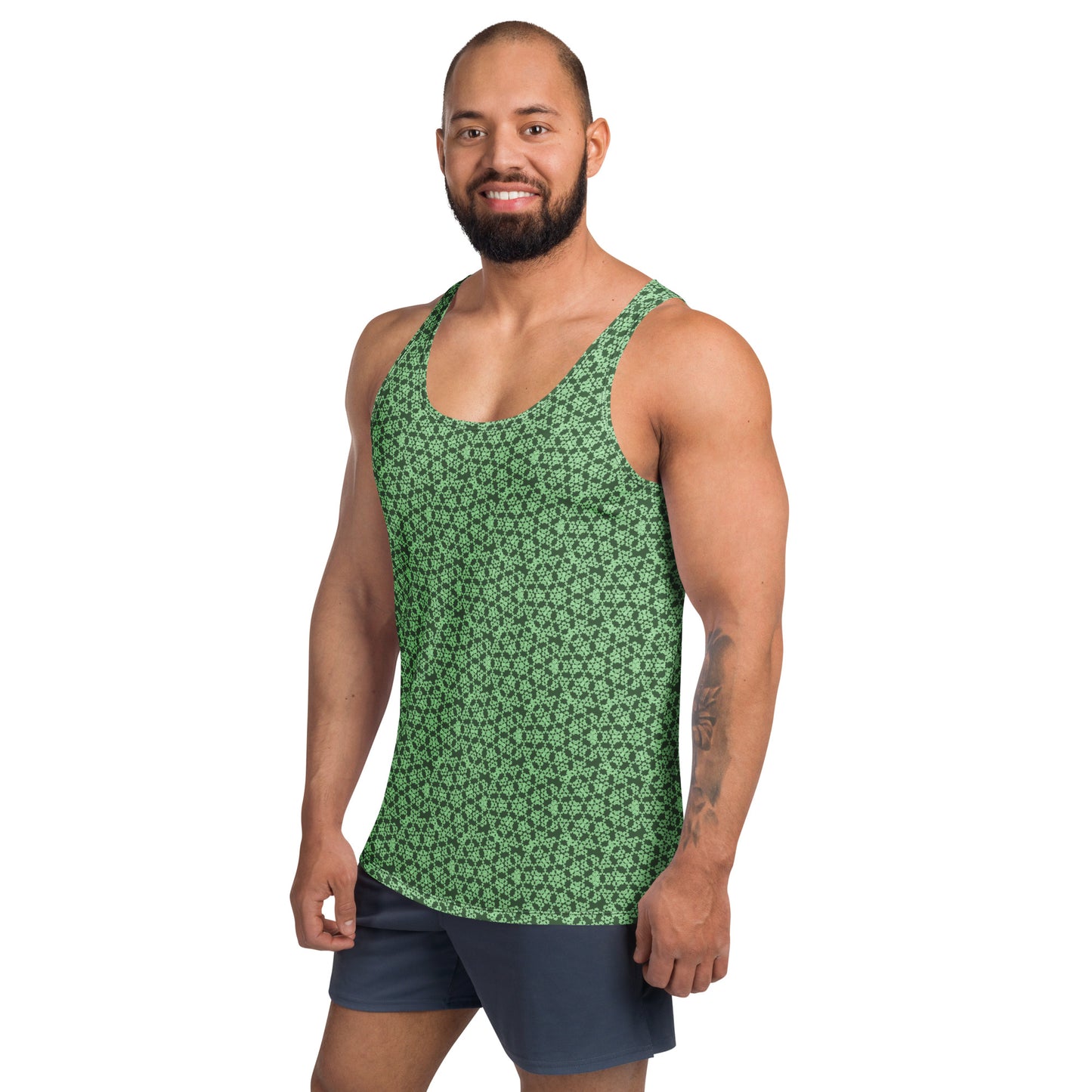 Left front shot of a model wearing the men's tank top with the 'Heptagon' green fractal geometric pattern.