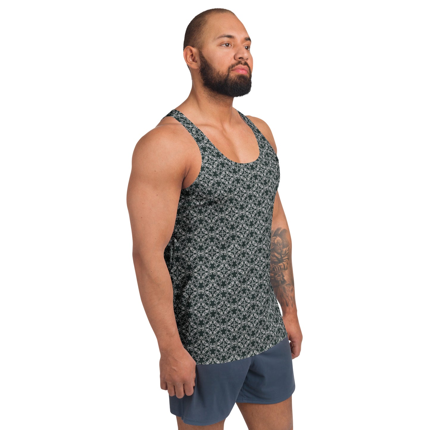 Right front shot of a model wearing the men's tank top with the 'Quadragon' charcoal and white fractal geometric pattern.