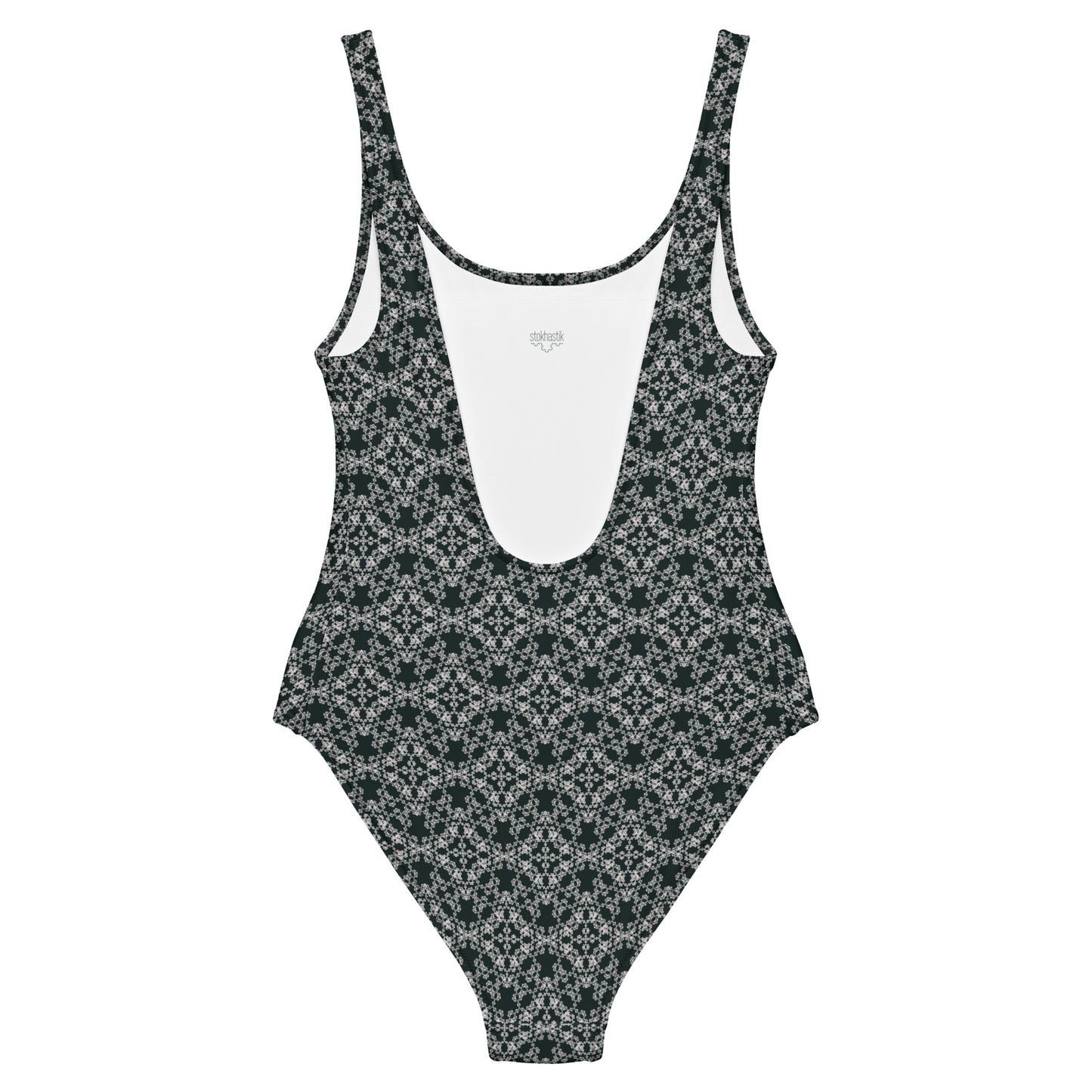Back of the one-piece swimsuit with the 'Quadragon' charcoal and white fractal geometric pattern.