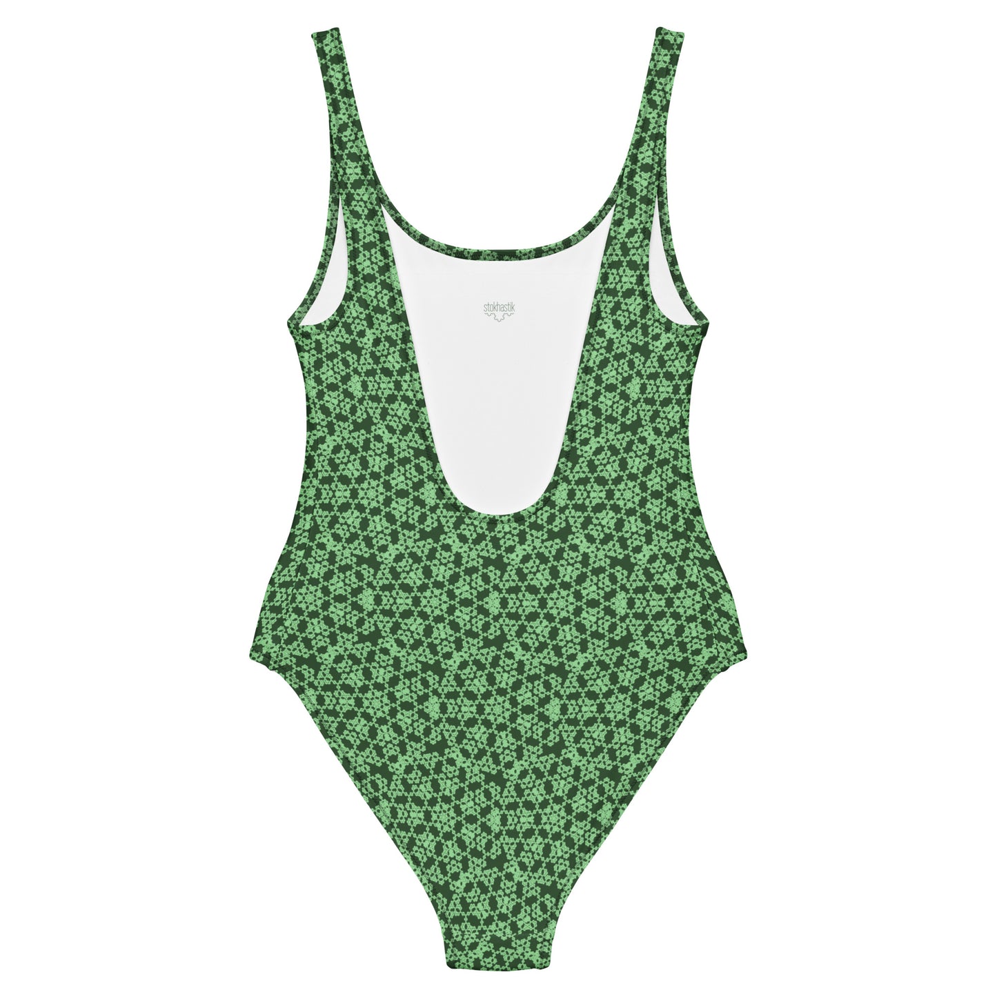 Back of the one-piece swimsuit with the 'Heptagon' green fractal geometric pattern.