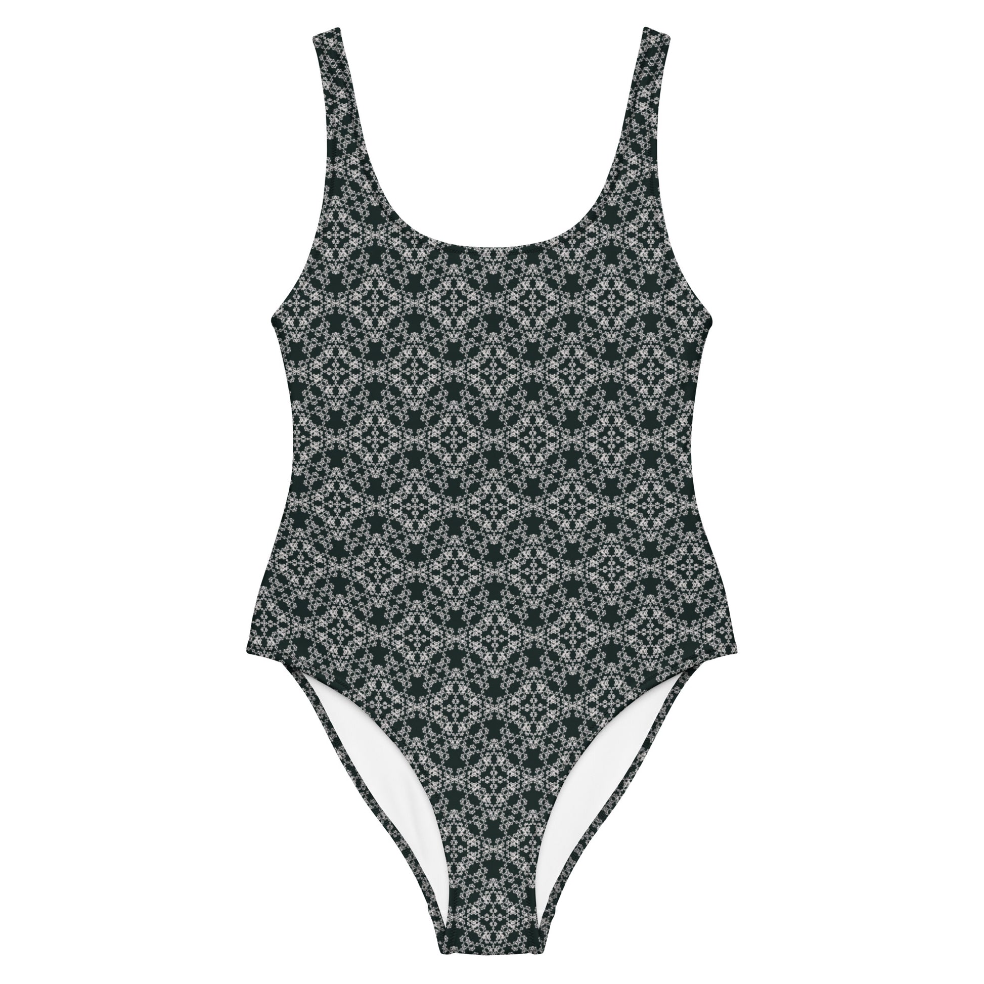 Front of the one-piece swimsuit with the 'Quadragon' charcoal and white fractal geometric pattern.