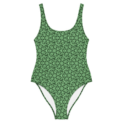 Front of the one-piece swimsuit with the 'Heptagon' green fractal geometric pattern.