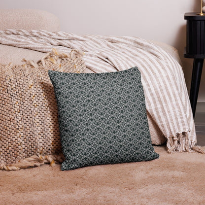 18″×18″ premium throw pillow with the 'Tetragon' charcoal and white geometric pattern on a couch.