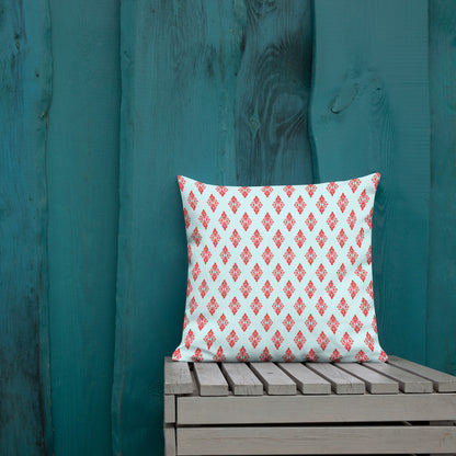 18″×18″ premium throw pillow with the 'Digon' sky blue and red geometric pattern shown in a lifestyle setting.