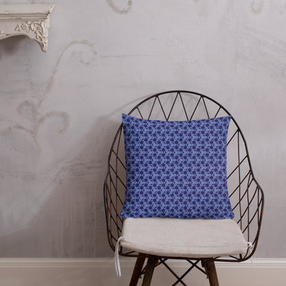18″×18″ premium throw pillow with the 'Trigon' navy and blue geometric pattern shown in a lifestyle setting.
