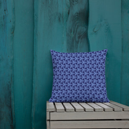 18″×18″ premium throw pillow with the 'Trigon' navy and blue geometric pattern shown in a lifestyle setting.