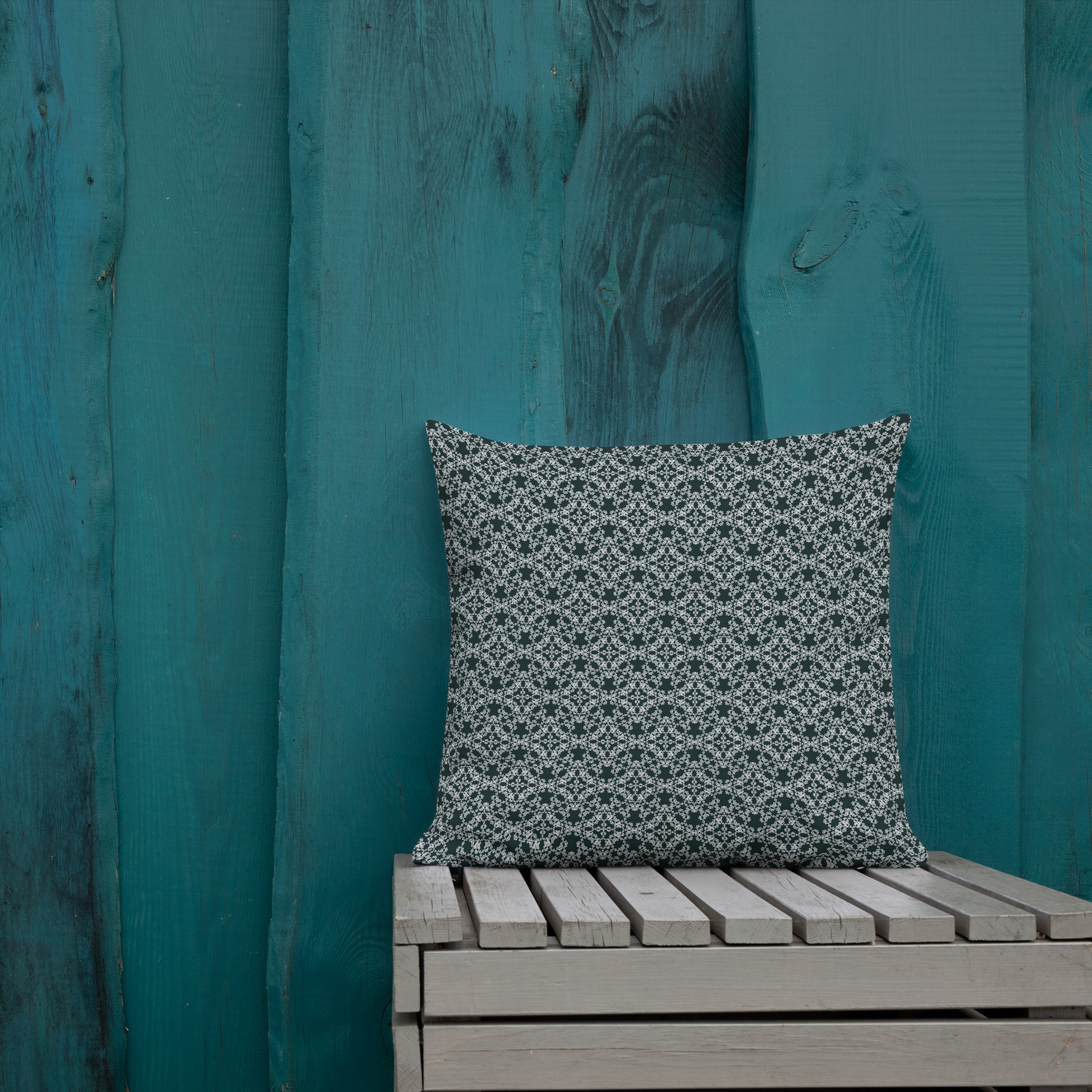 18″×18″ premium throw pillow with the 'Tetragon' charcoal and white geometric pattern shown in a lifestyle setting.
