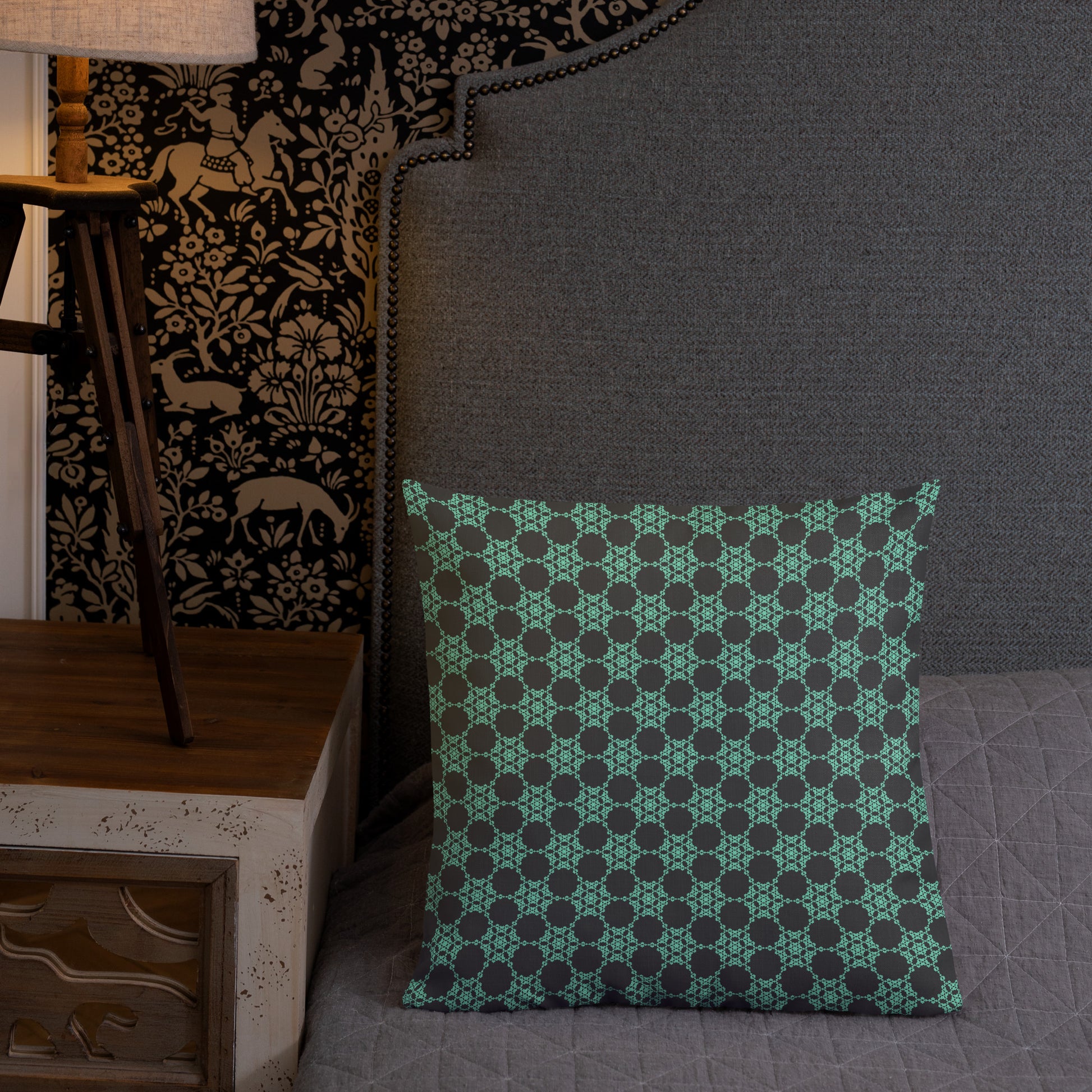 18″×18″ premium throw pillow with the 'Flowers Victory' charcoal and mint geometric pattern shown in a lifestyle setting.