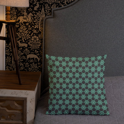 18″×18″ premium throw pillow with the 'Flowers Victory' charcoal and mint geometric pattern shown in a lifestyle setting.