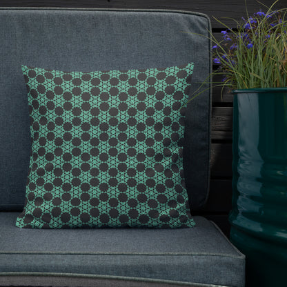 18″×18″ premium throw pillow with the 'Flowers Victory' charcoal and mint geometric pattern shown in a lifestyle setting.