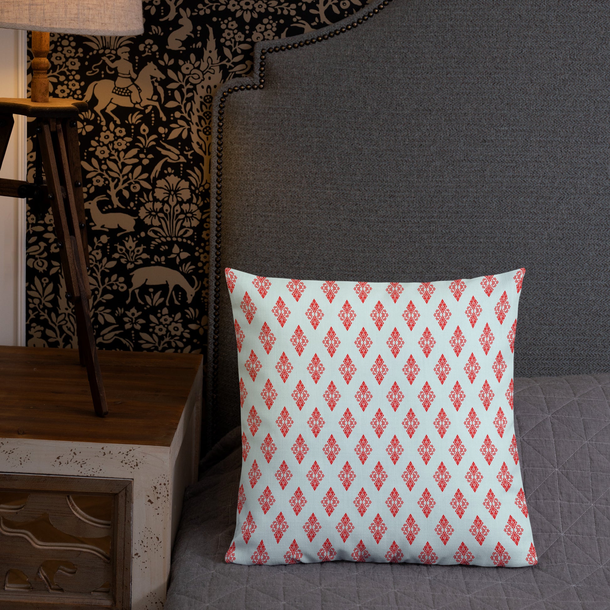 18″×18″ premium throw pillow with the 'Digon' sky blue and red geometric pattern shown in a lifestyle setting.