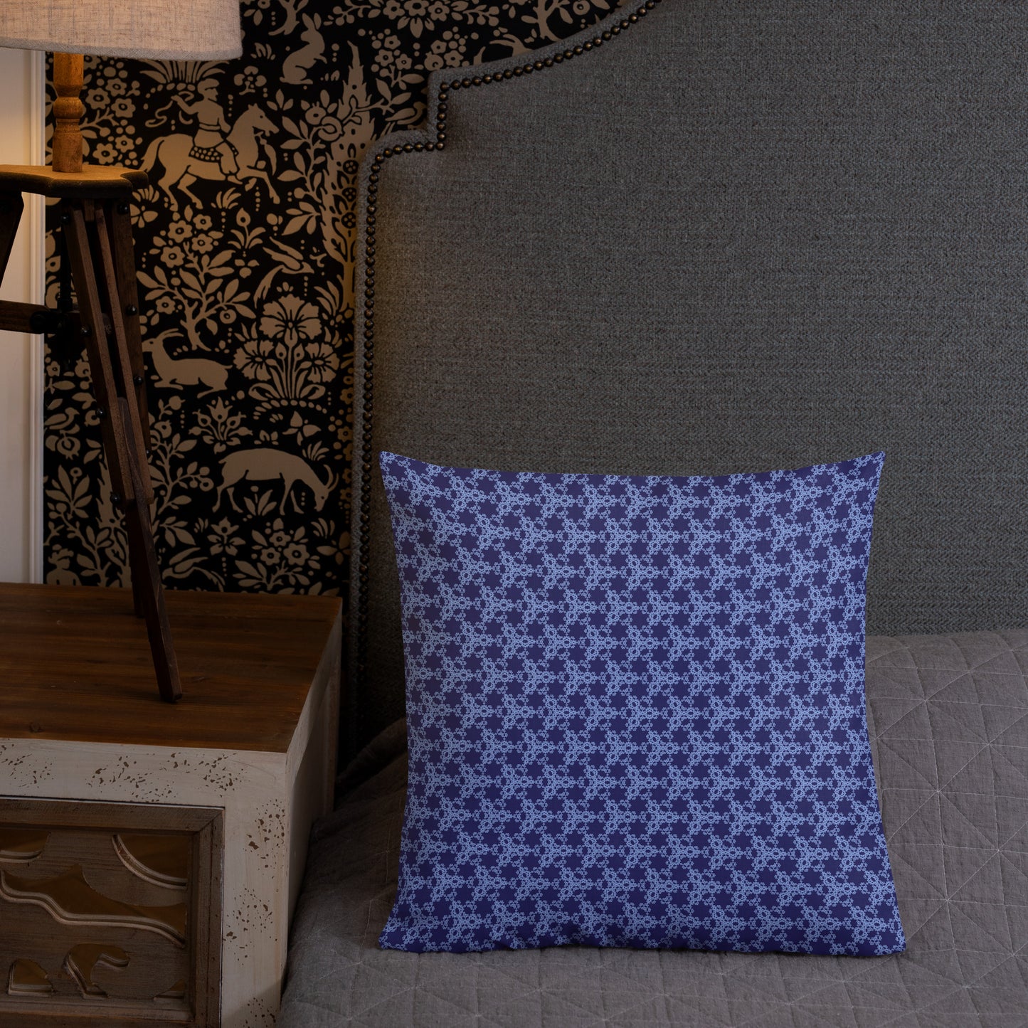 18″×18″ premium throw pillow with the 'Trigon' navy and blue geometric pattern shown in a lifestyle setting.