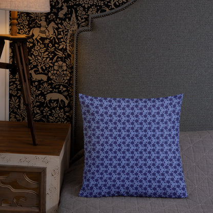 18″×18″ premium throw pillow with the 'Trigon' navy and blue geometric pattern shown in a lifestyle setting.