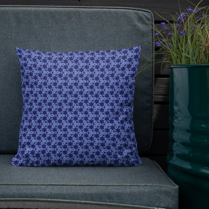 18″×18″ premium throw pillow with the 'Trigon' navy and blue geometric pattern shown in a lifestyle setting.