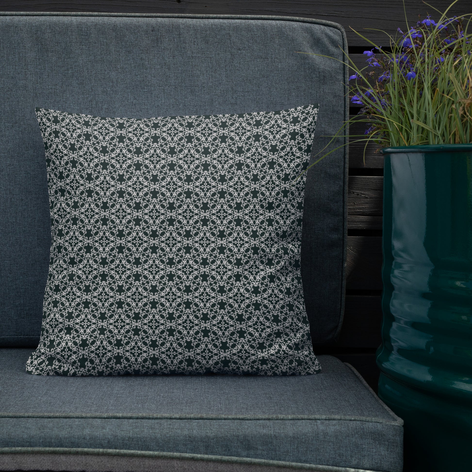 18″×18″ premium throw pillow with the 'Tetragon' charcoal and white geometric pattern shown in a lifestyle setting.