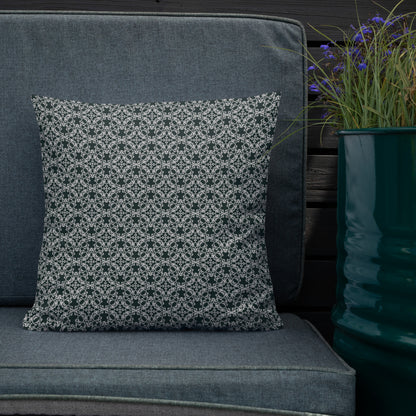 18″×18″ premium throw pillow with the 'Tetragon' charcoal and white geometric pattern shown in a lifestyle setting.