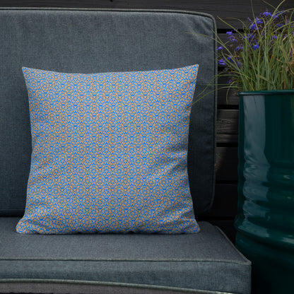 18″×18″ premium throw pillow with the 'Pentagon' blue and yellow geometric pattern shown in a lifestyle setting.