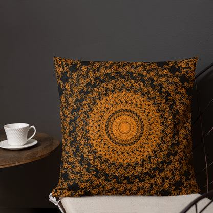18″×18″ premium throw pillow with the 'The Sun' orange and black geometric design shown in a lifestyle setting.