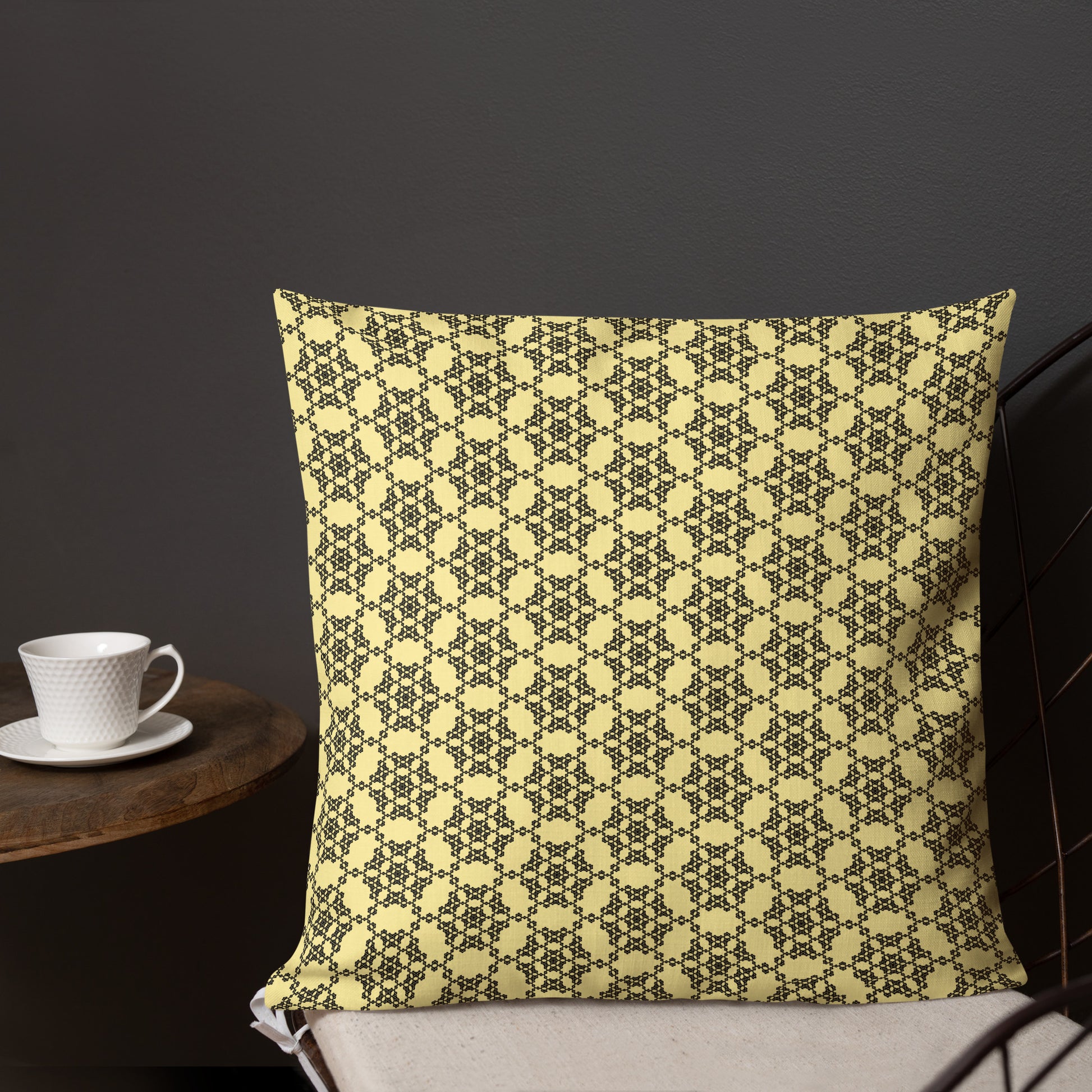 18″×18″ premium throw pillow with the 'Hexagon' yellow and black geometric pattern shown in a lifestyle setting.