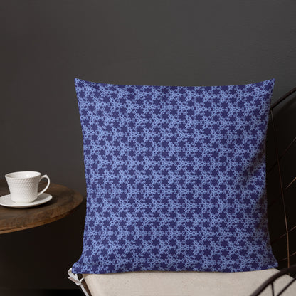 18″×18″ premium throw pillow with the 'Trigon' navy and blue geometric pattern shown in a lifestyle setting.