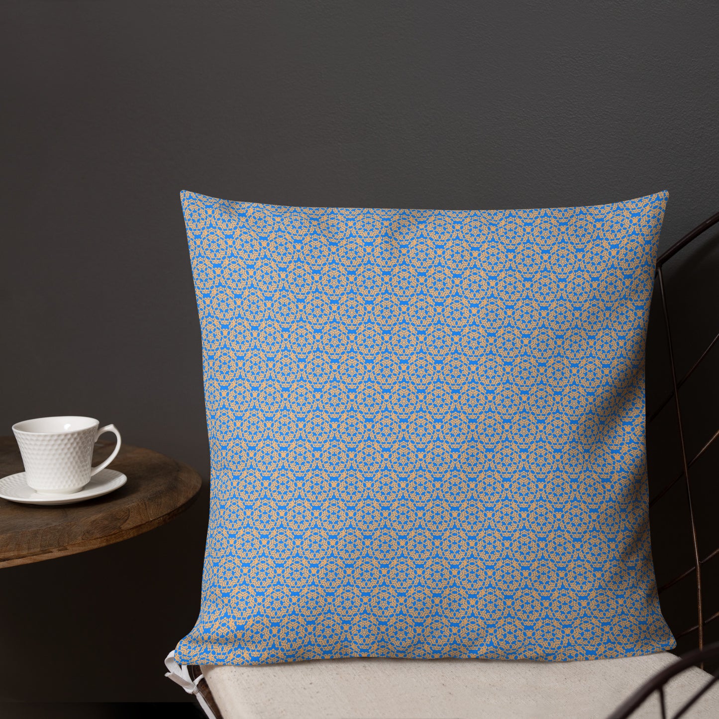 18″×18″ premium throw pillow with the 'Pentagon' blue and yellow geometric pattern shown in a lifestyle setting.