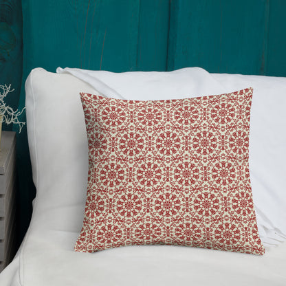 18″×18″ premium throw pillow with the ‘Decagon’ terracotta and beige geometric pattern on a white bed with a teal wooden headboard.