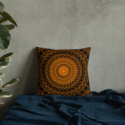 18″×18″ premium throw pillow with the 'The Sun' orange and black geometric design on a bed.