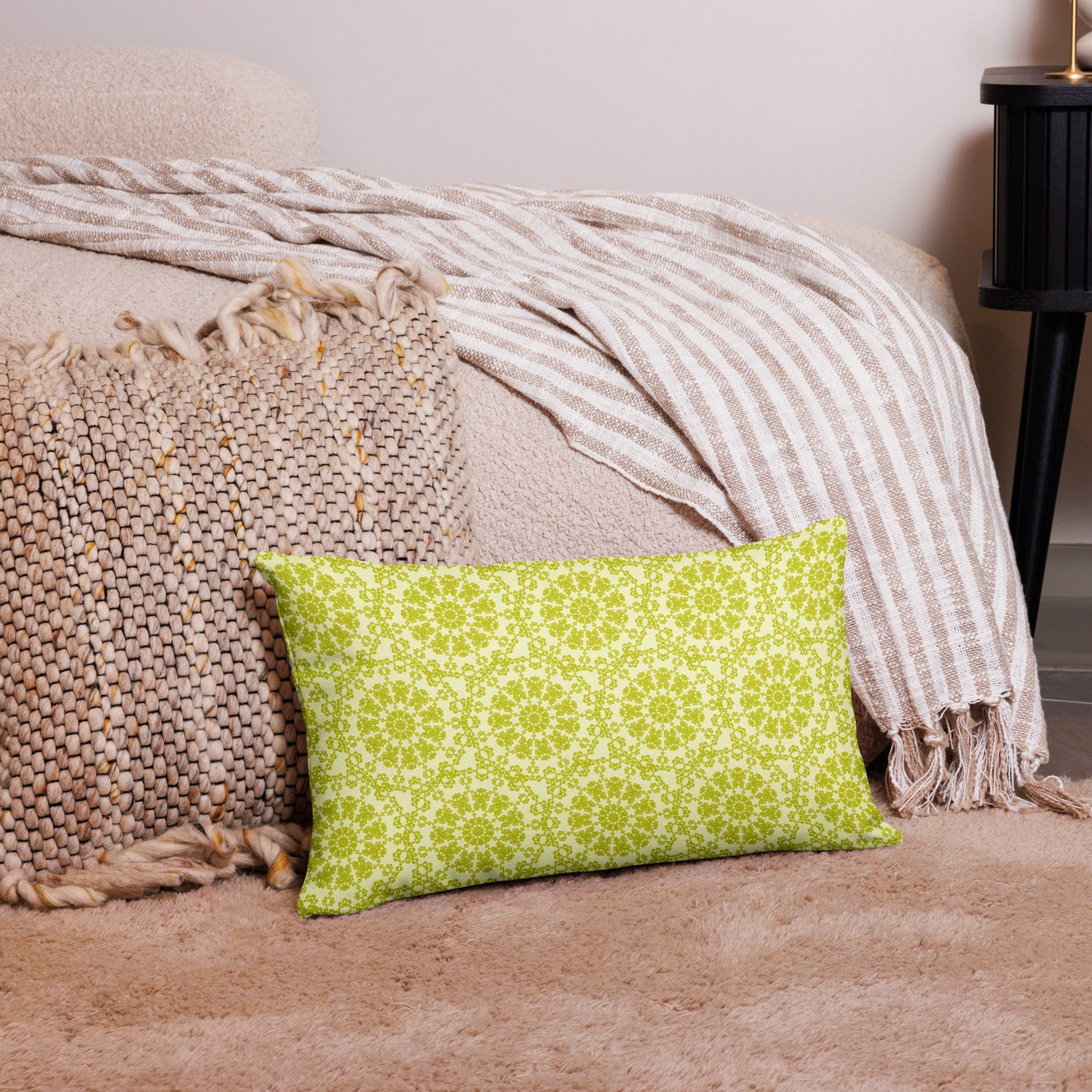 20″×12″ premium throw pillow with the 'Hendecagon' yellow-green geometric pattern in a cozy floor setting