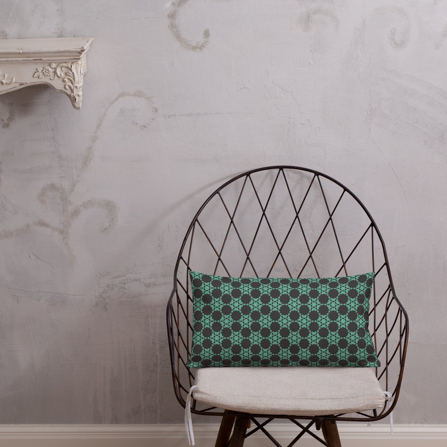 20″×12″ premium throw pillow with the 'Flowers Victory' charcoal and mint geometric pattern shown in a lifestyle setting.