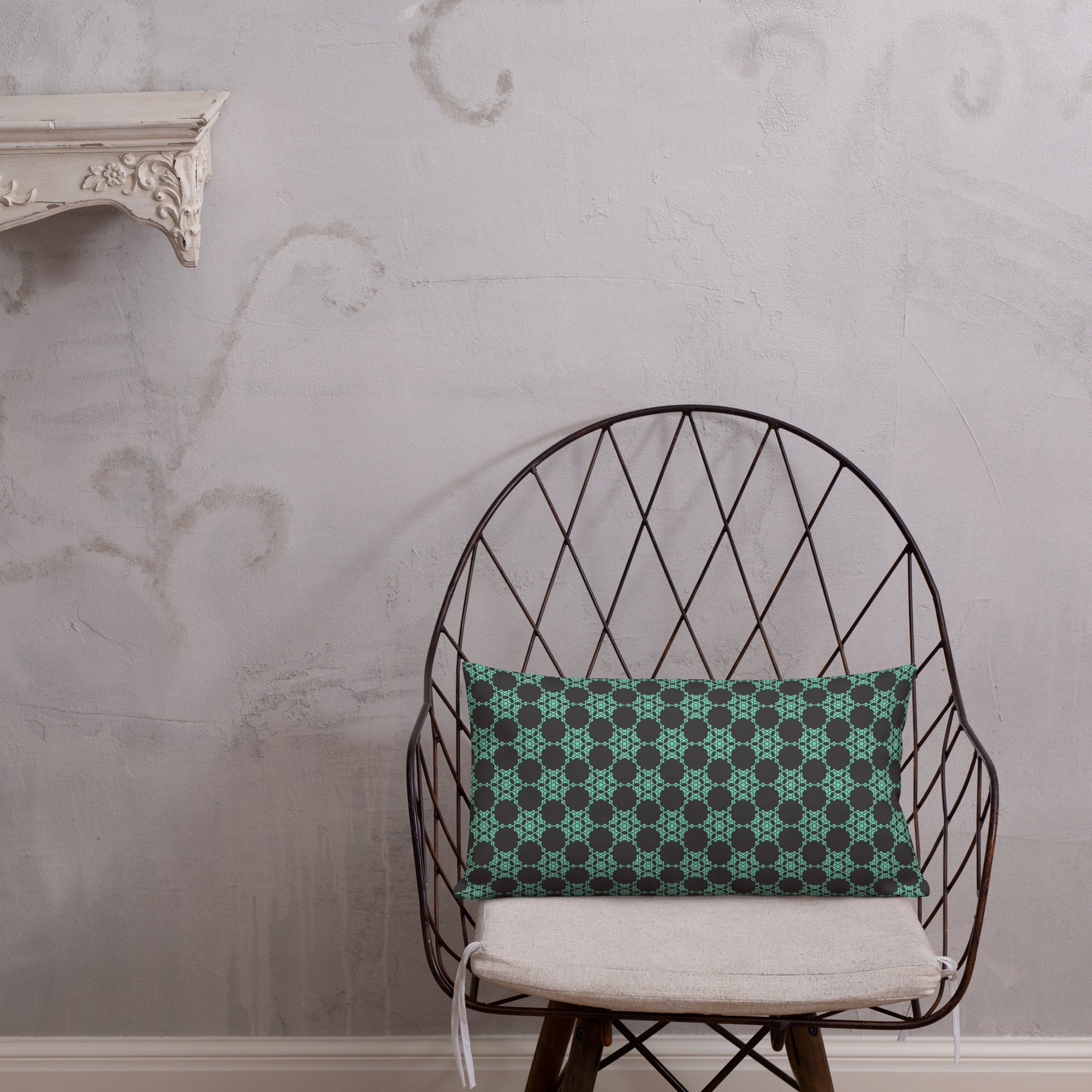 20″×12″ premium throw pillow with the 'Flowers Victory' charcoal and mint geometric pattern shown in a lifestyle setting.