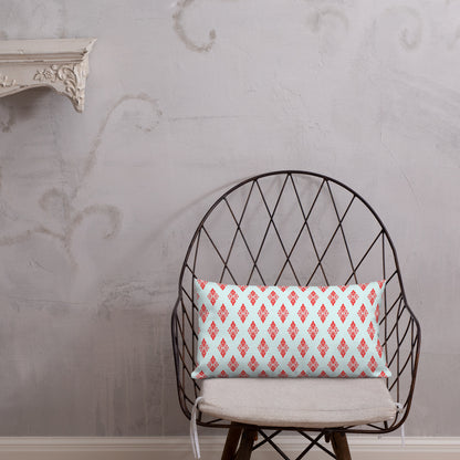 20″×12″ premium throw pillow with the 'Digon' sky blue and red geometric pattern shown in a lifestyle setting.